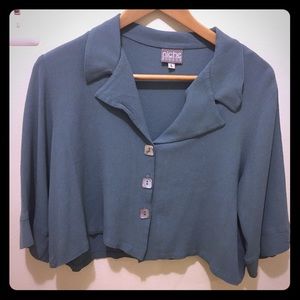 Beautiful teal colored dress top.